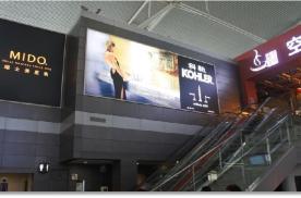 陕西咸阳渭城区西安咸阳国际机场T3安检层扶梯旁机场灯箱