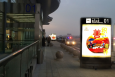 内蒙古包头东河区包头东河机场出发层门口旁的车道附近22G-J001、2、3机场灯箱广告